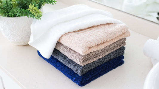 Glodina snag proof range of bath towels in white, beige, pebble, charcoal and navy