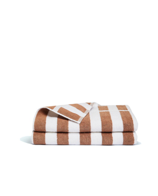 linen and white striped pool towel 